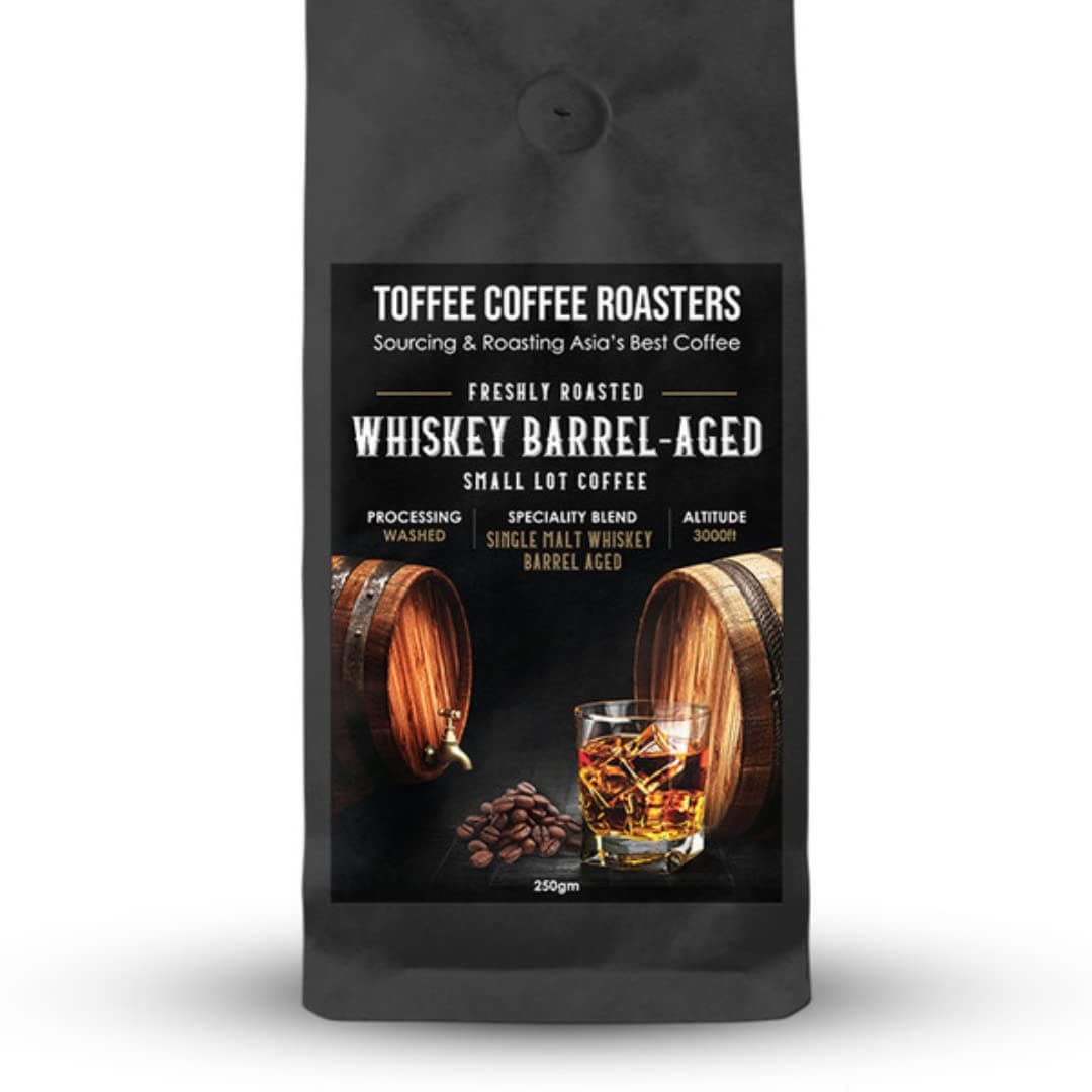 Single Malt Whiskey Barrel Aged Coffee | 100% Arabica | Medium Dark Roast | Grounded Coffee Notes: Fine Malt and Green Apple | Grind: Whole Beans| Freshly Roasted | 250 gm