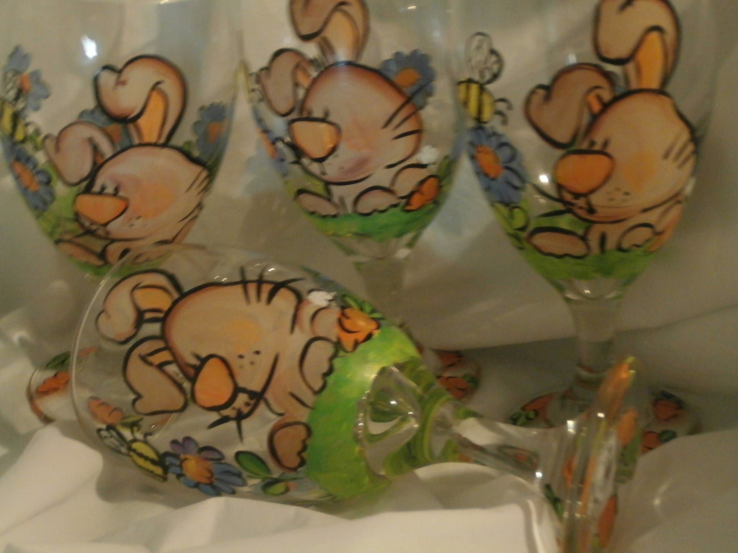 Hand painted Bunny/flowers. set of 4 short stemmed ice tea glasses.