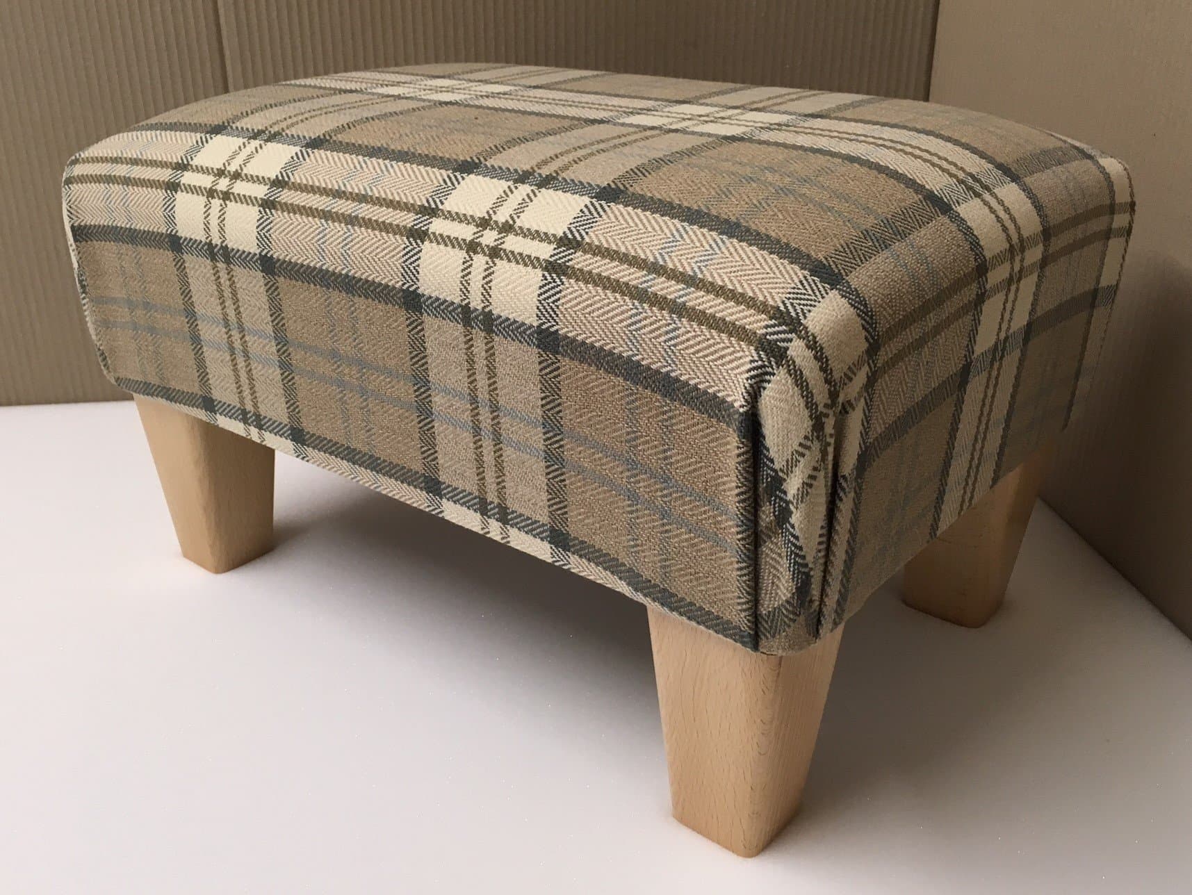 Elegance Furnishings Footstool/pouffee in a brown and beige tartan fabric.also available in different coloured fabrics.just ask and we can make it for you